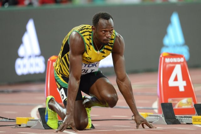 Usain Bolt i startblokkene under 100 meter heat ved VM i atletik 2015